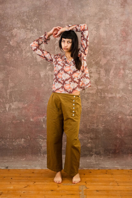 model wearing frill blouse sula flower print frill blouse