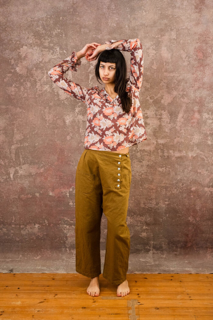 model wearing frill blouse sula flower print frill blouse