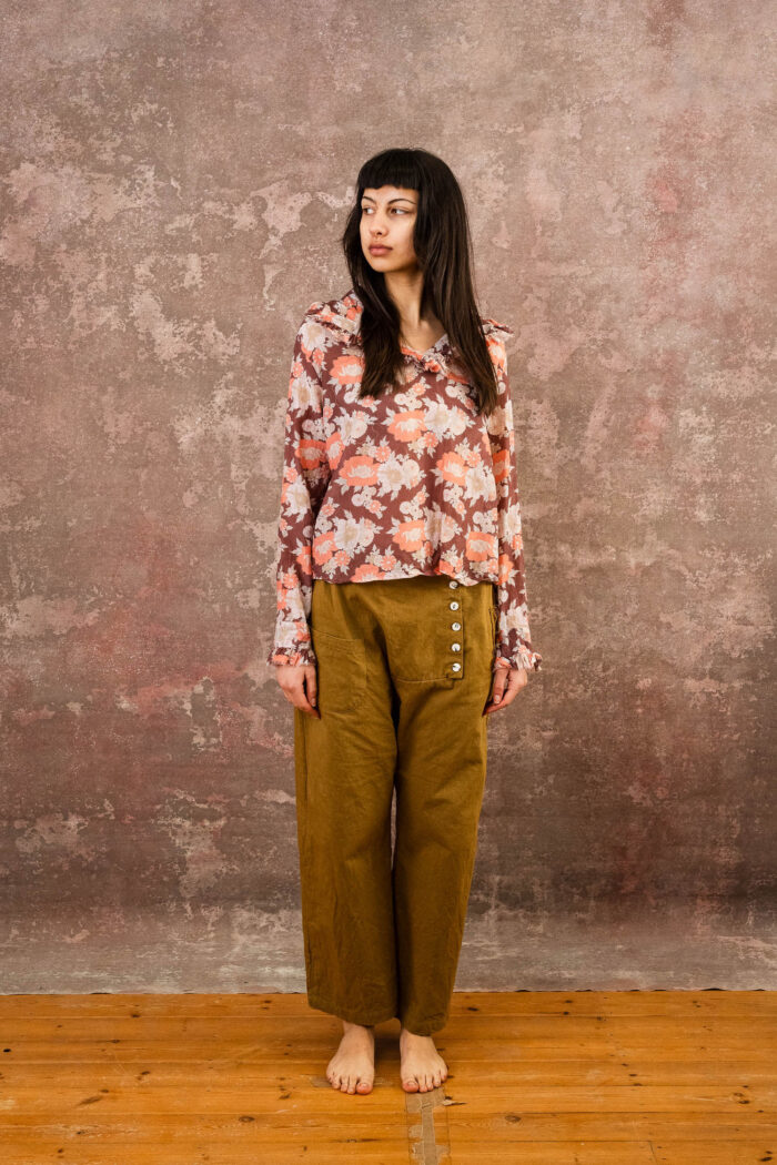 model wearing frill blouse sula flower print frill blouse